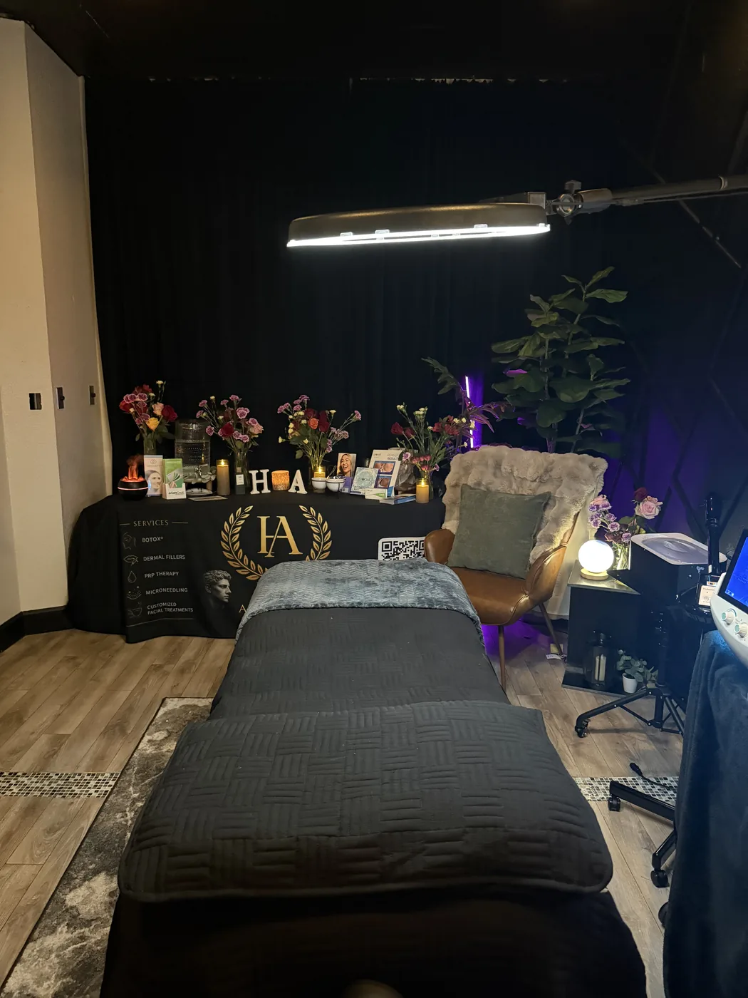 Treatment suite with spa bed and product display